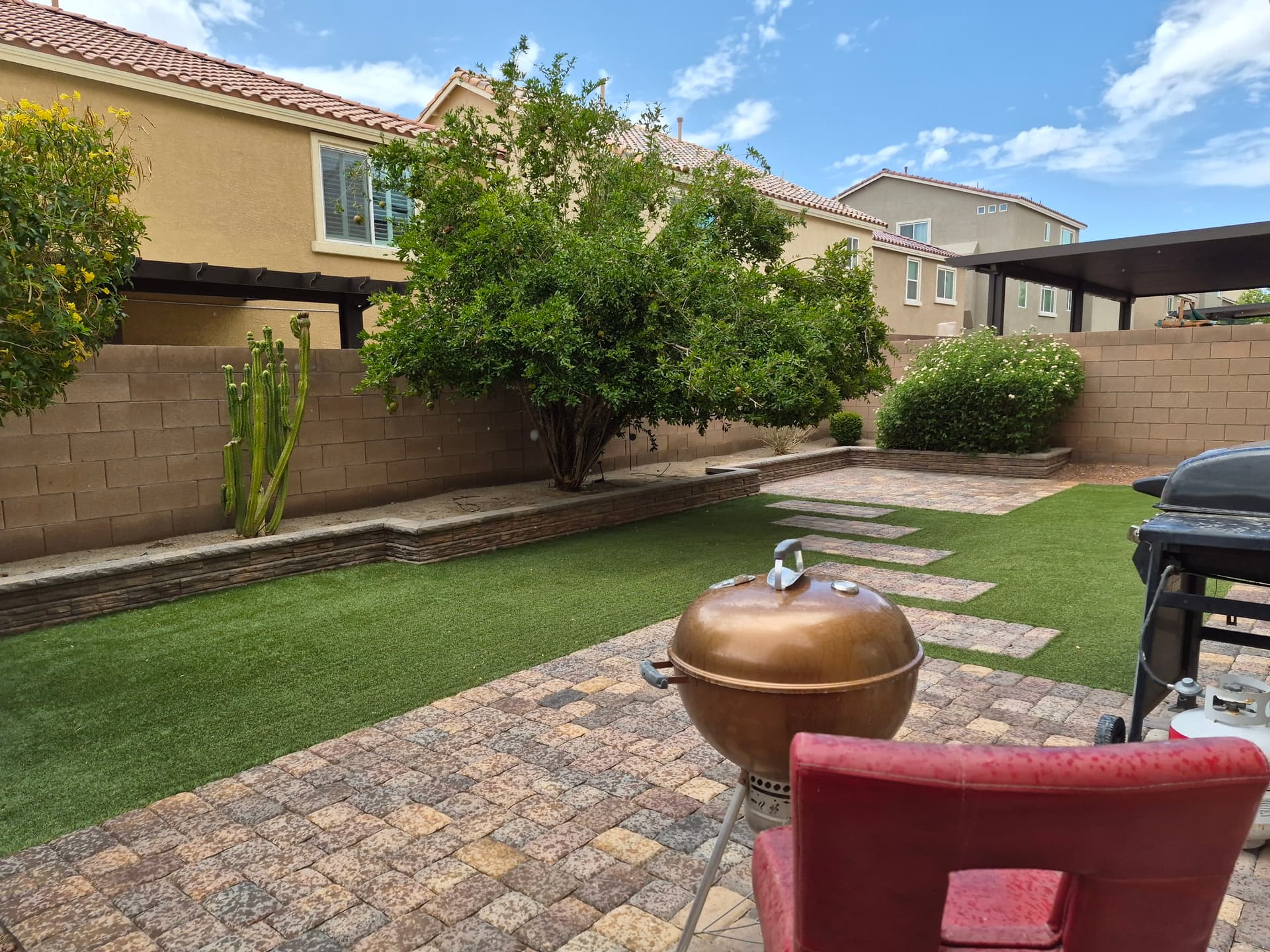 Gallery photos for Backyard Patio Design with Turf and Pavers Done Right: Image #1