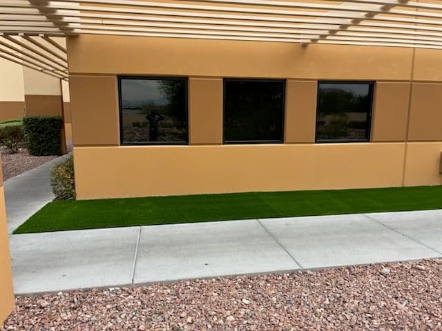 Commercial Area Transformed with Green Turf image