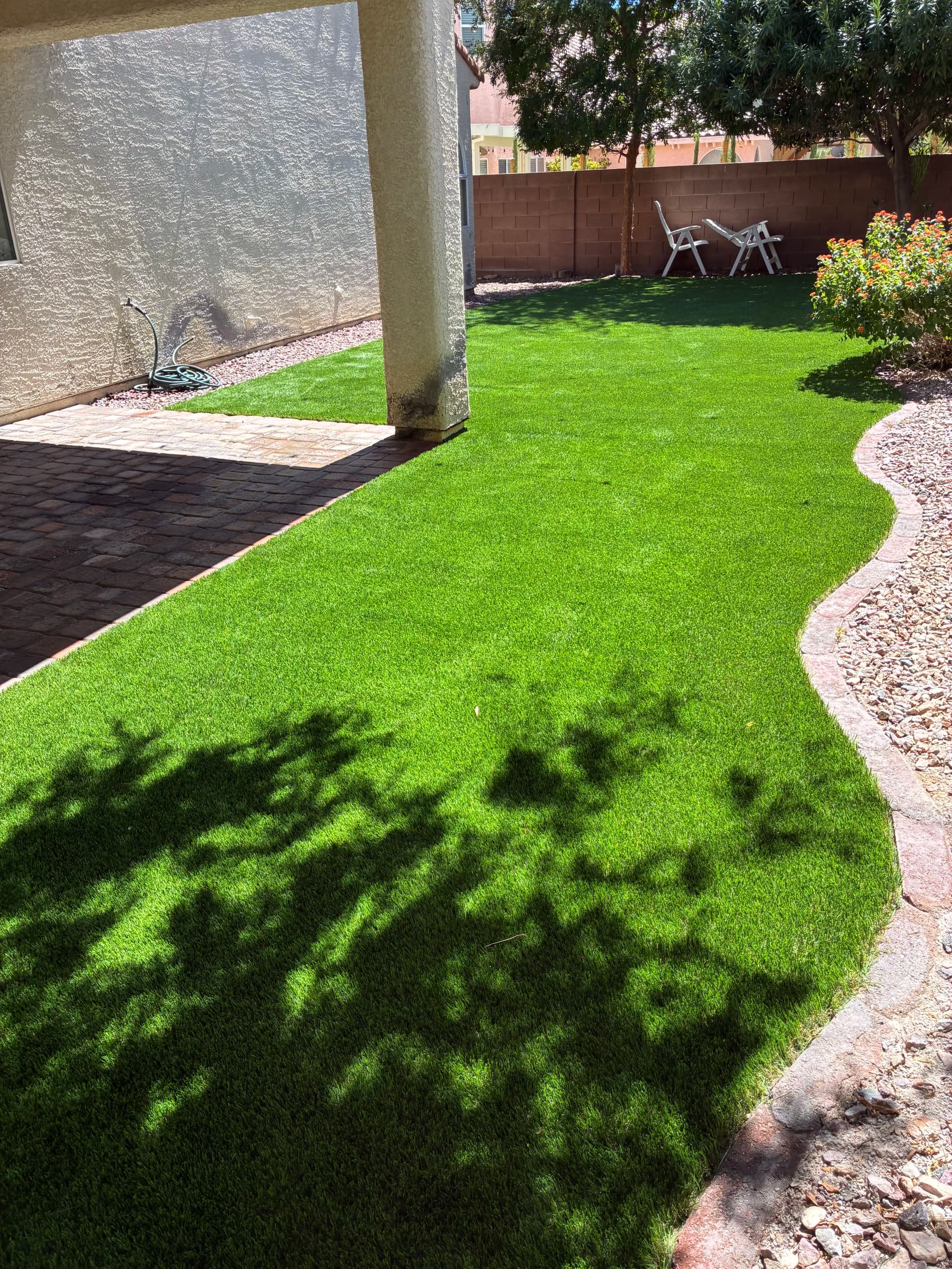 Gallery photos for Patchy Backyard Lawn Replaced with Lush Artificial Turf: Image #7