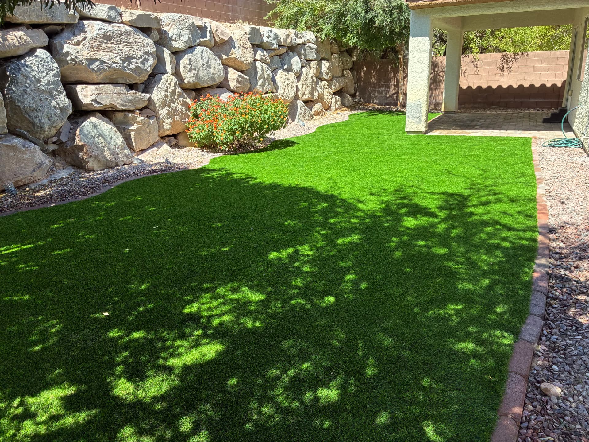 Gallery photos for Patchy Backyard Lawn Replaced with Lush Artificial Turf: Image #4