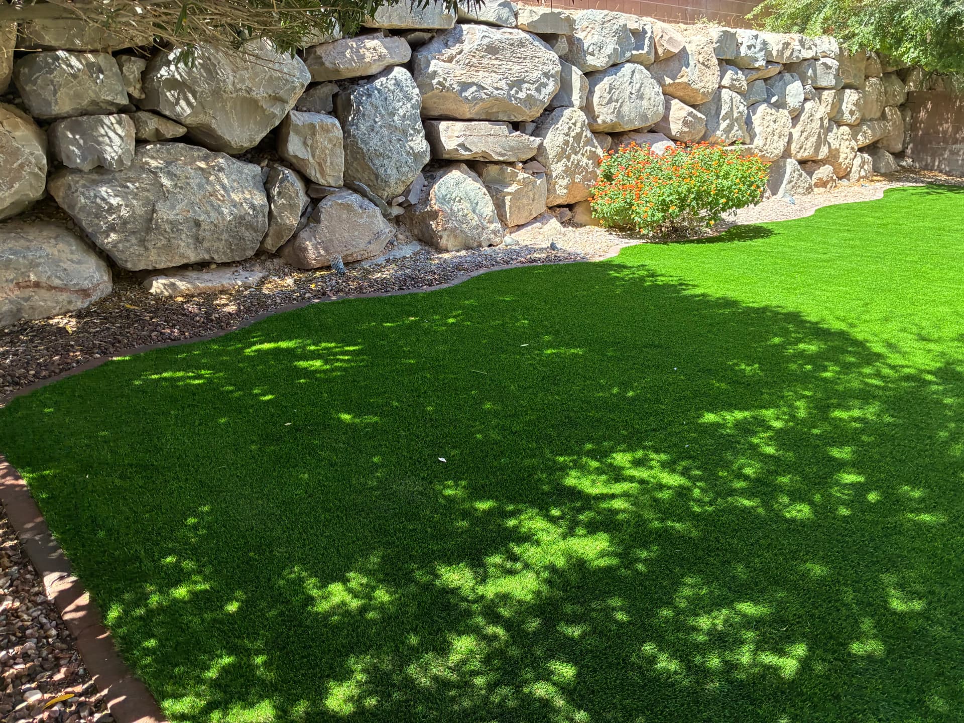 Gallery photos for Patchy Backyard Lawn Replaced with Lush Artificial Turf: Image #3